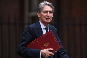 British Chancellor of the Exchequer Philip Hammond arrives for the weekly cabinet meeting at 10 Downing Street in London on October 18, 2016. British Prime Minister Theresa May's office sought to downplay cabinet tensions over Brexit on October 17 after reports her finance minister is antagonising colleagues with his warnings about the economic dangers. / AFP / JUSTIN TALLIS        (Photo credit should read JUSTIN TALLIS/AFP/Getty Images)